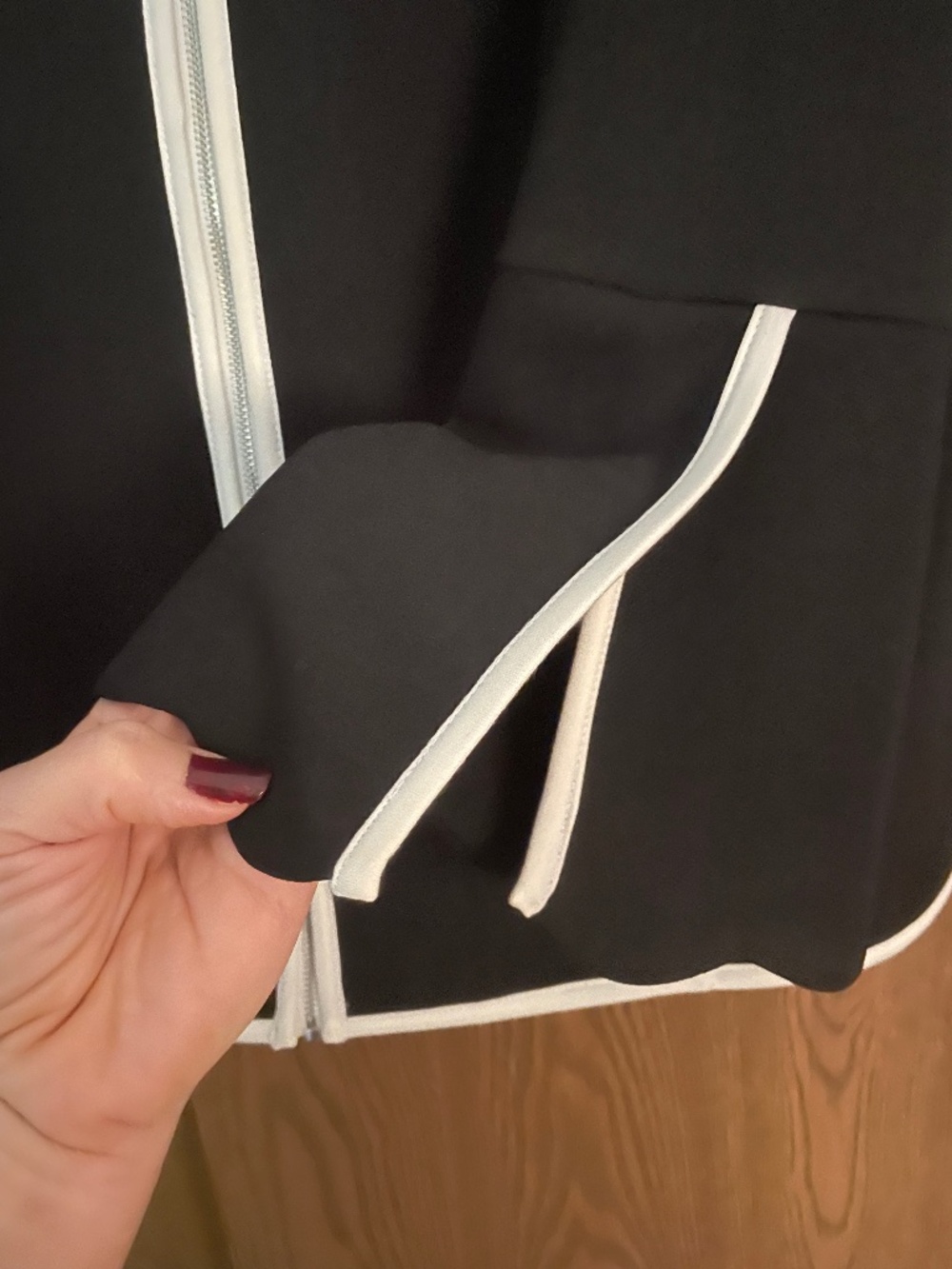 Rafaela 2X plus Black Zip‑Front Jacket with White Trim & Split Sleeve Detail